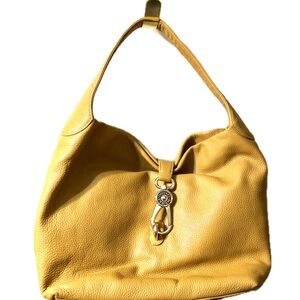 Dooney and Bourke “Florentine” Logo Lock bag